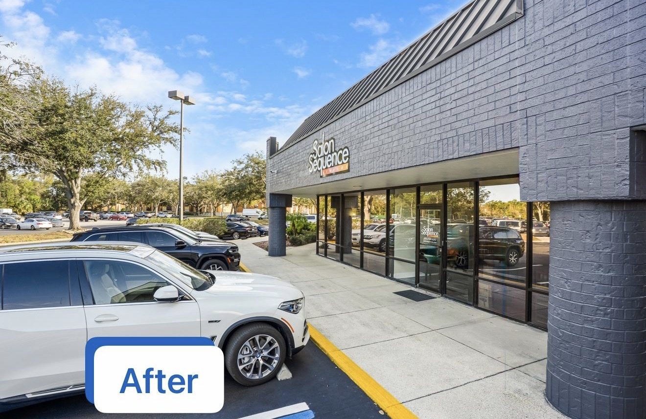 Grand Plaza Shopping Center storefront in Carrollwood after brick was painted